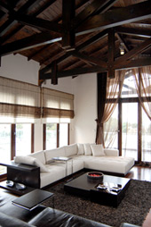 Loft living room with high wood ceilings