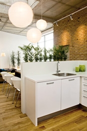 Open concept kitchen is typical for lofts